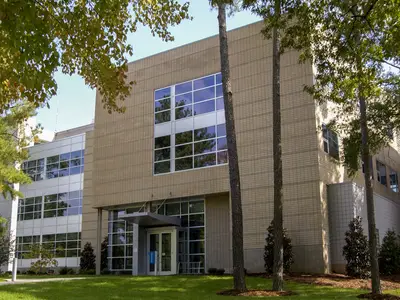 Exterior of the Cox building at RTI International headquarters in Research Triangle Park, North Carolina.