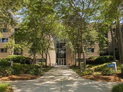 An exterior view of the Hobbs building, headquarters of RTI Health Solutions, on RTI's Research Tria