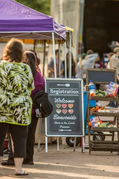 shoppers at a farmers market