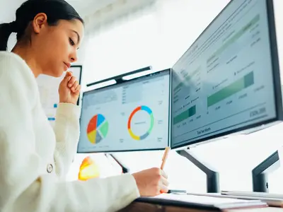 woman working with data on computer