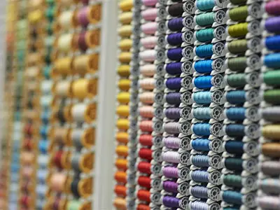Various colors of cotton wheels on the wall