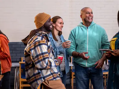 People standing in a group talking