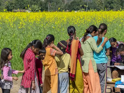 Women and girls standing in a line