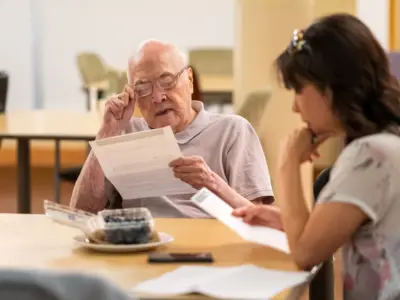 Senior man reviewing paperwork