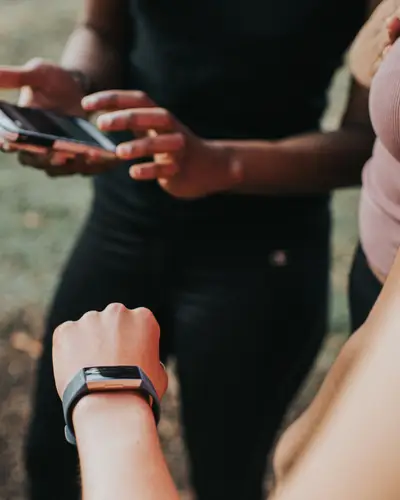 Person checking wearable watch