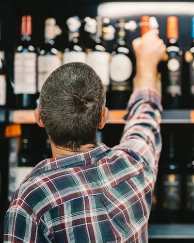 Man shops for alcohol