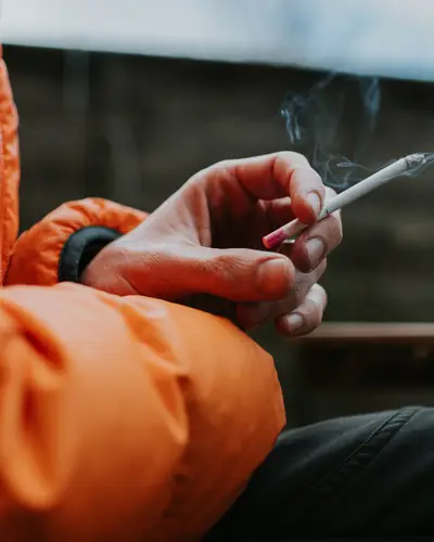 Woman holding a cigarette