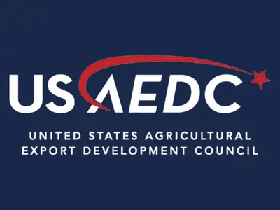 USAEDC logo: white letters with red shooting star on a dark blue background