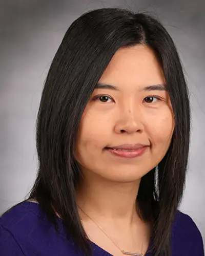 Headshot of Dr. Fang Fang, research statistical geneticist at RTI