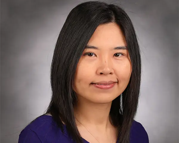 Headshot of Dr. Fang Fang, research statistical geneticist at RTI