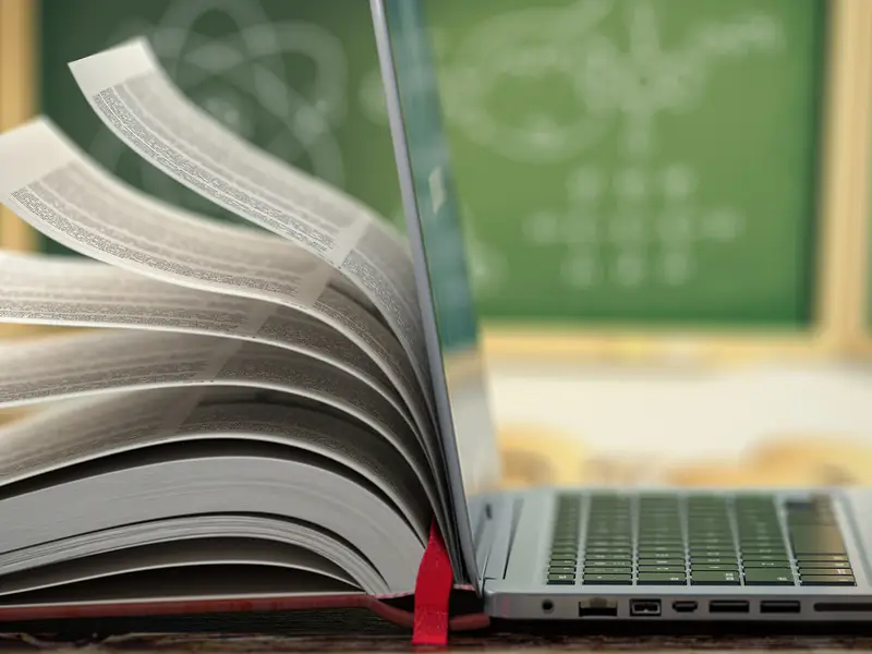 laptop and book