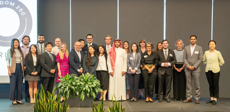 Delegates from G20 member countries gather for a group photo