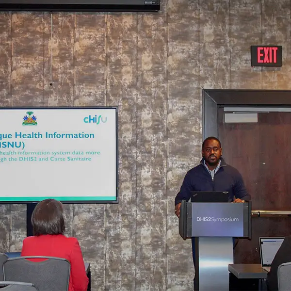 Jhonson Charles leads a presentation about RTI’s work using DHIS2 to develop a facility registry in Haiti to track health facility services.
