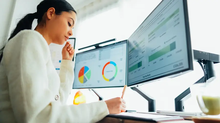 woman working with data on computer