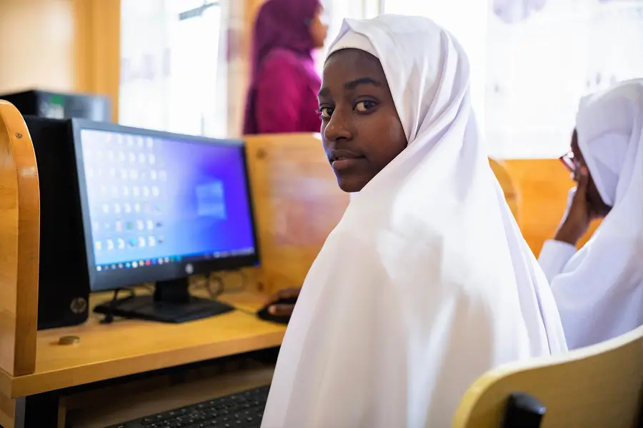 Female student at a computer in Zanzibar