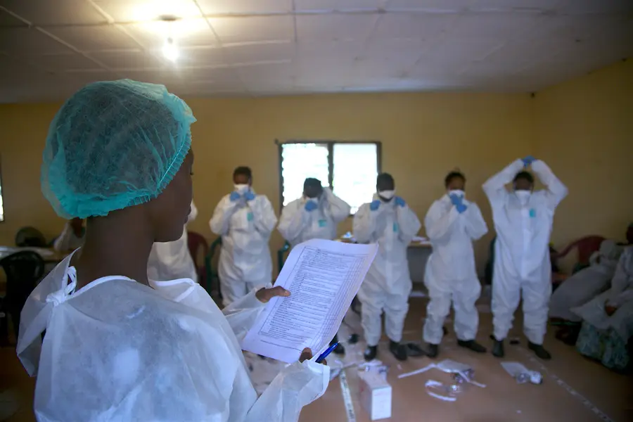 Photo of people wearing personal protective equipment