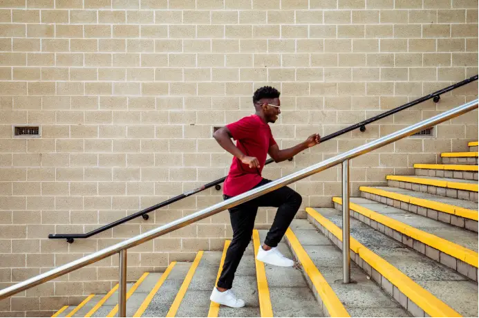 Man running up stairs