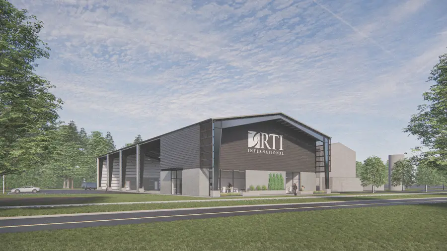 Graphic of new RTI Pilot Xcelerator. Building with offices and open garage space