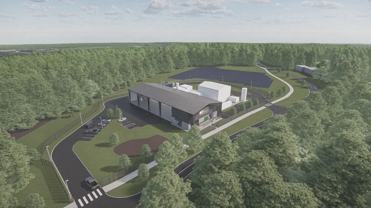 Aerial shot of drawing for the new RPX. Big open building with a solar panel field and trees