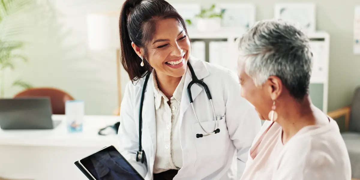 Primary Care Doctor with Patient