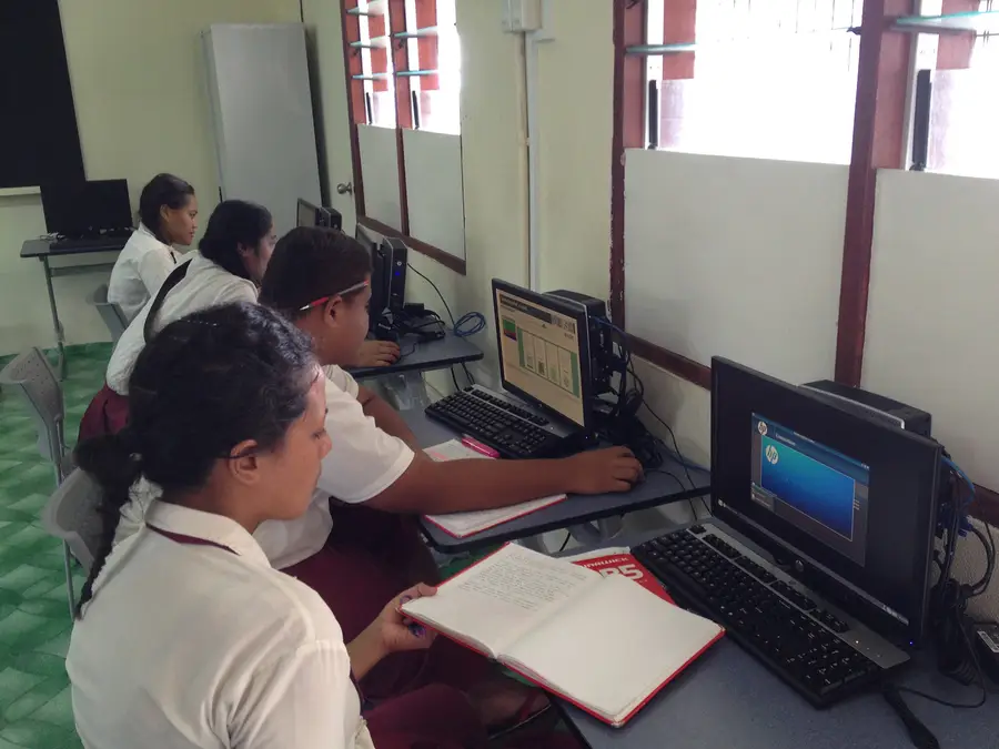 Students in Samoa work in a school computer lab.