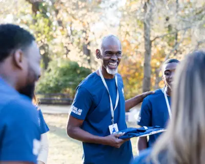 Community volunteer with group