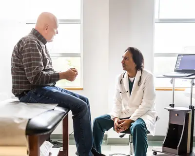 Doctor consults patient
