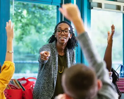 Teacher interacts with students