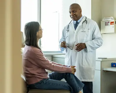 Doctor consults patient
