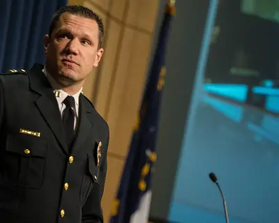 Police Officer in Uniform at RTI Crime Symposium