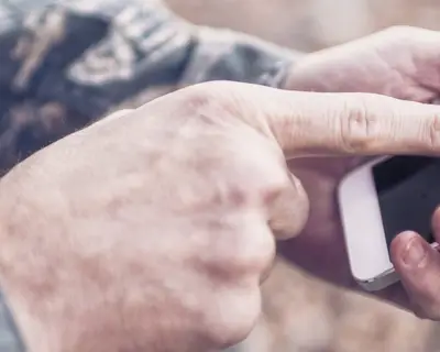 Solider using phone
