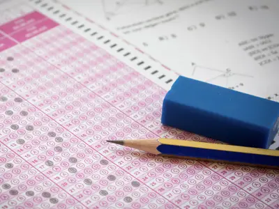 Standardized test with pencil and eraser