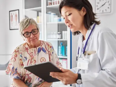 Doctor consults patient