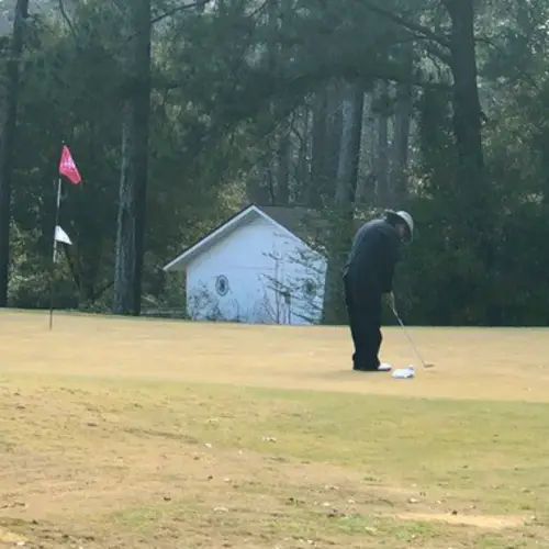 Cancer survivor Michael enjoying a game of golf.