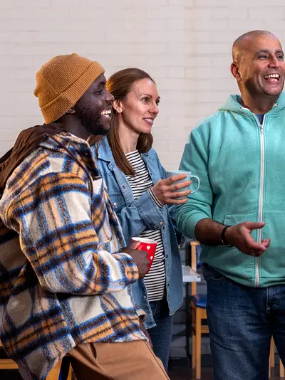 People standing in a group talking
