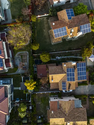 Image of rooftops featuring solar panels.
