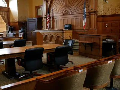 Photo of the interior of an empty courtroom