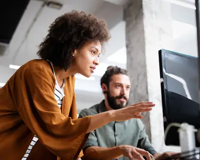 People working at computer
