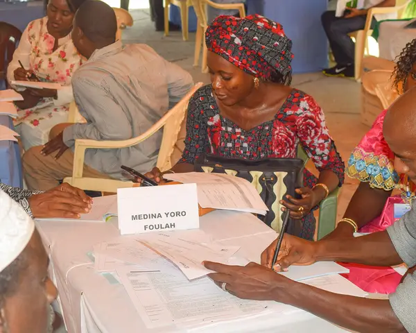 Partners meet at a Senegal GOLD forum to discuss priority investments for local communities.