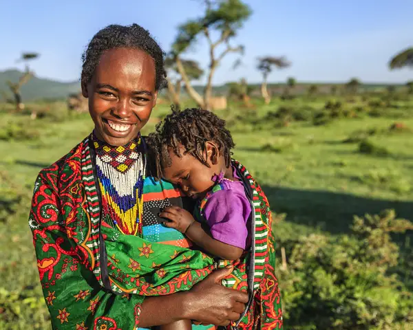 Woman holding child