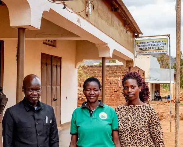 Photo of three people outside the KKAKKA head office