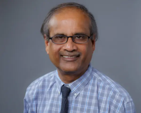 Dr. Partha Lahiri