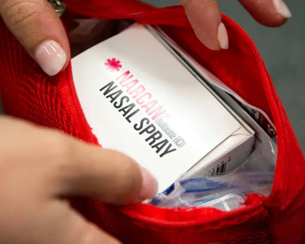 Pouch containing Narcan nasal spray.