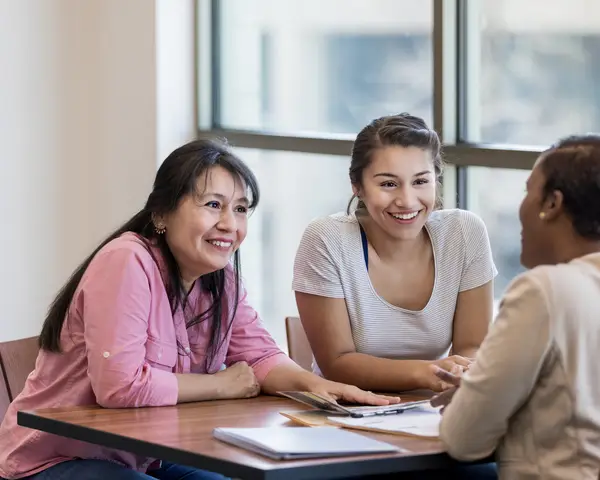 Three women having discussion