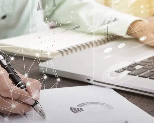 researcher working on data reports and graphs