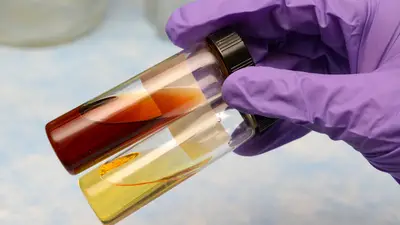 Samples of fluid that is orange and yellow